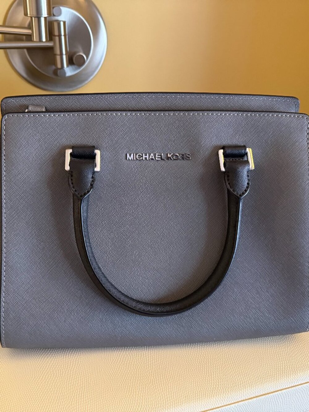 Grey Michael Kors handbag with black handles, dust cover, excellent condition